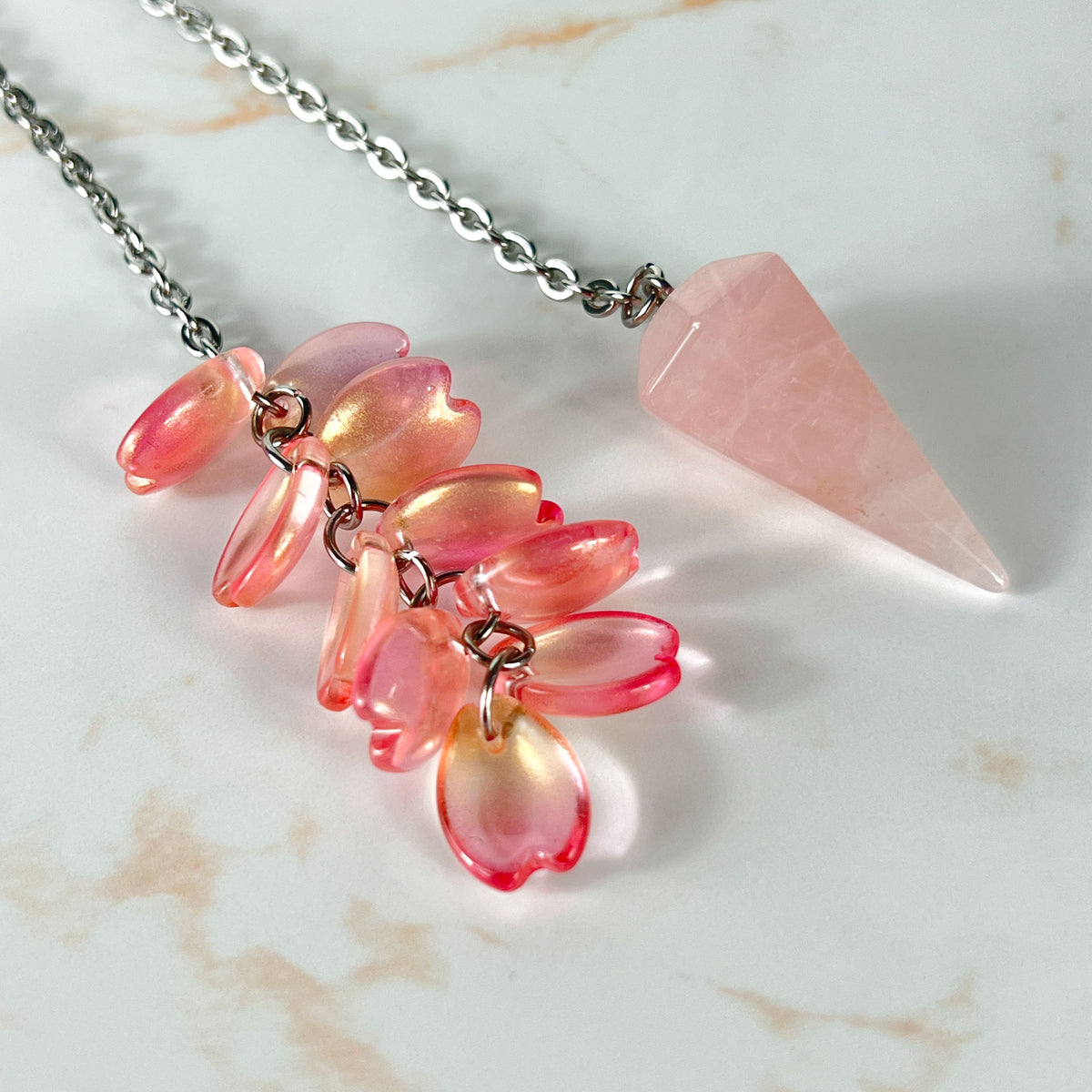 Rose quartz and sakura petals dowsing pendulum, stainless steel Baguette Magick