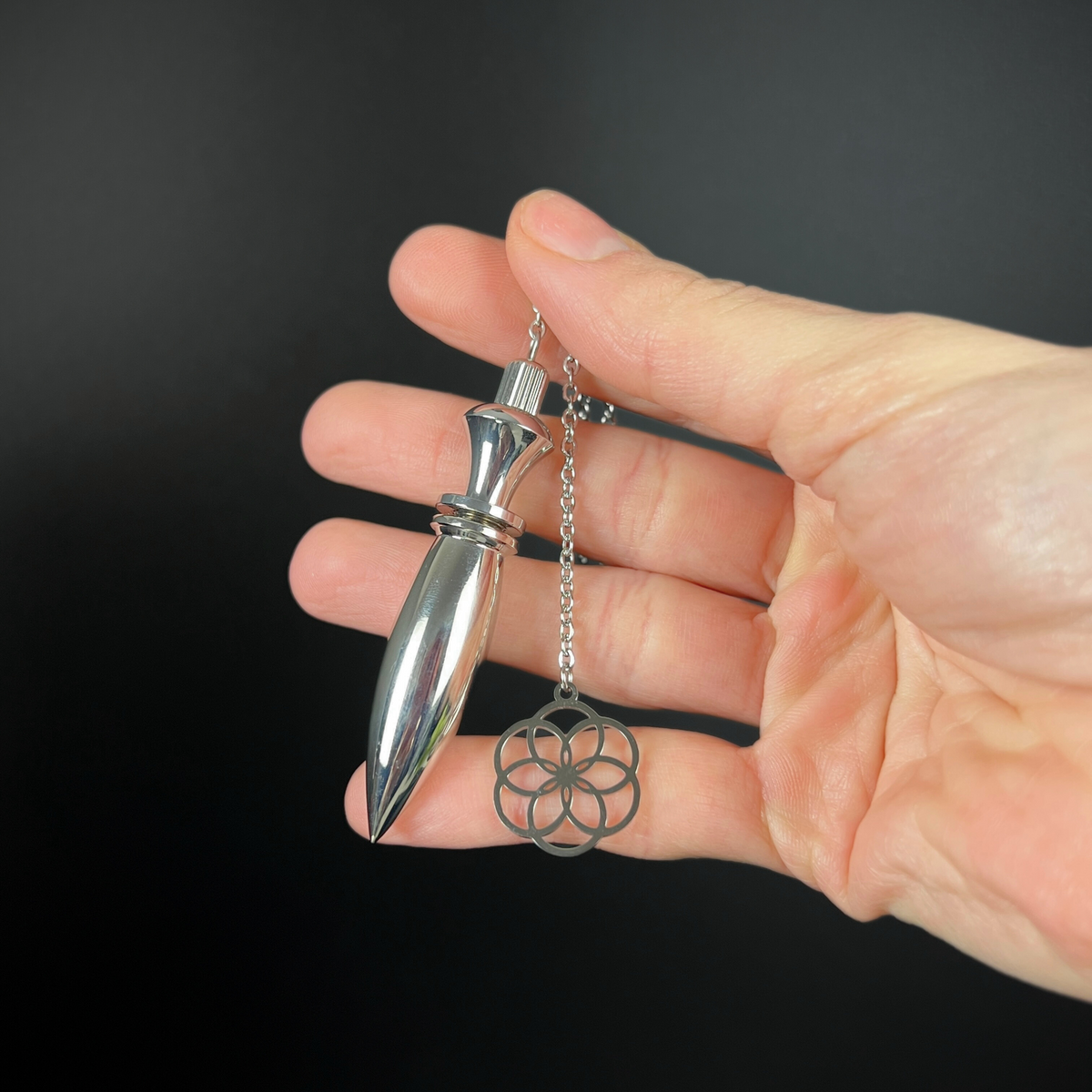 Metal Thot pendulum with a flower of life symbol Baguette Magick