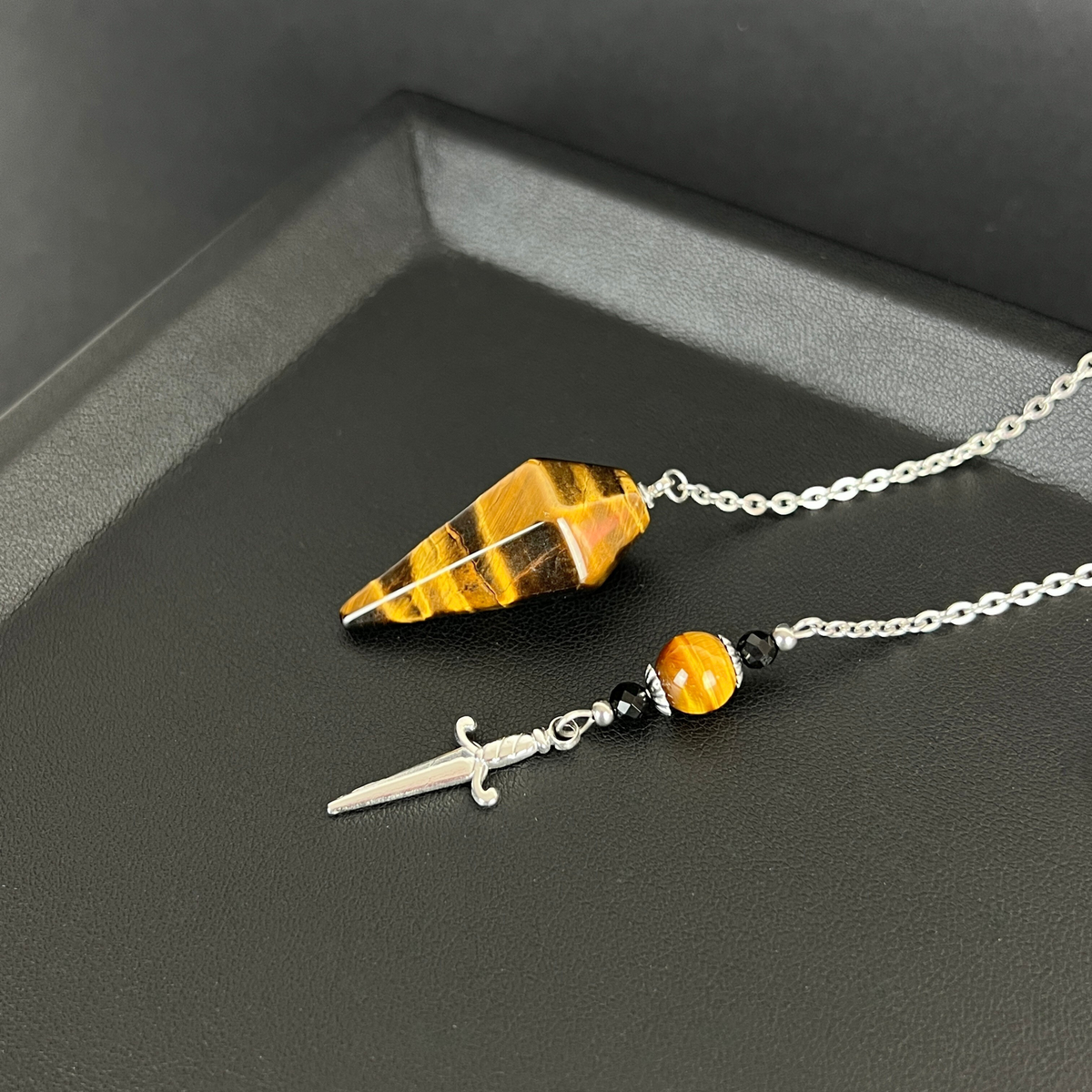 The athame pendulum, Tiger Eye, Onyx, stainless steel Baguette Magick