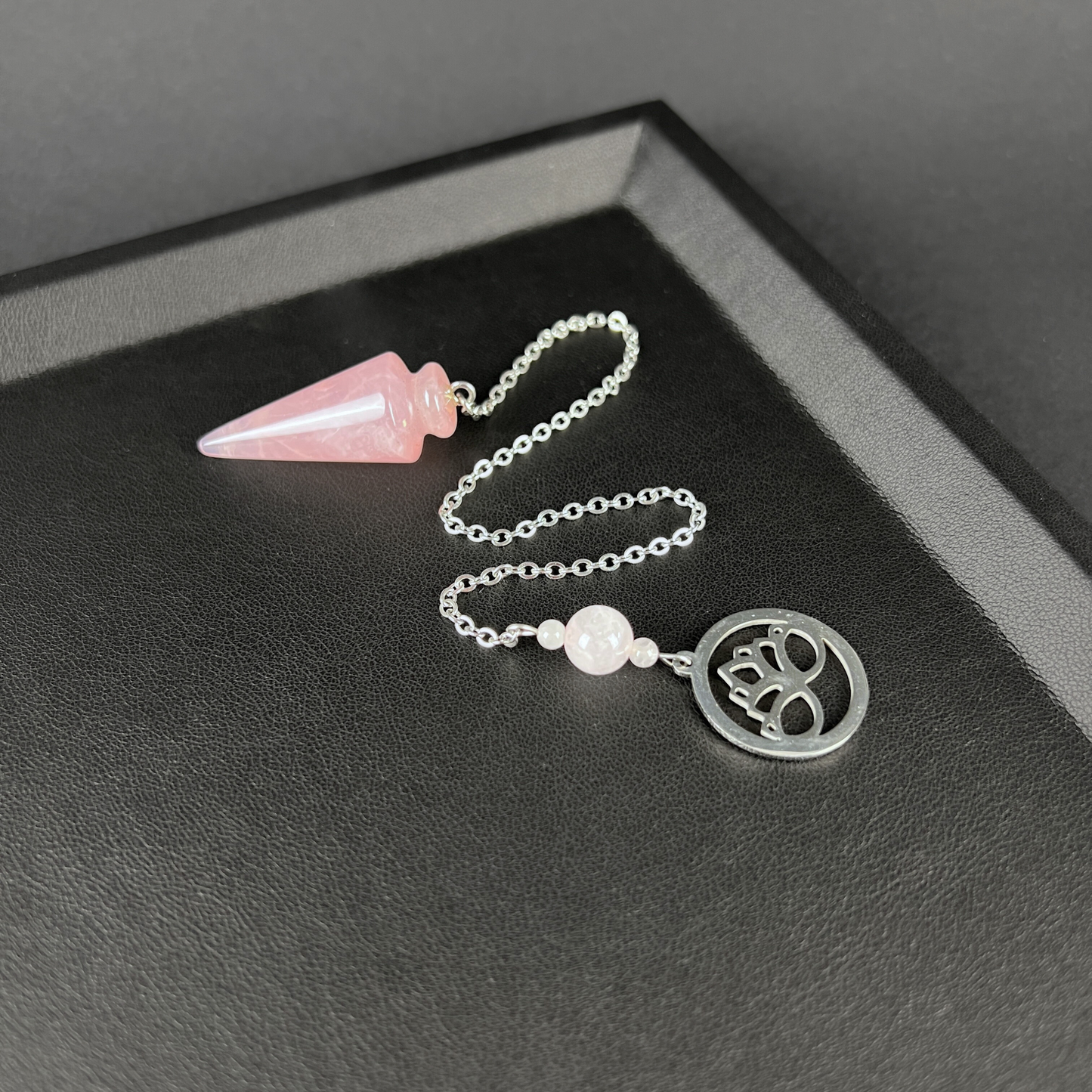 Rose quartz and stainless steel lotus flower pendulum Baguette Magick