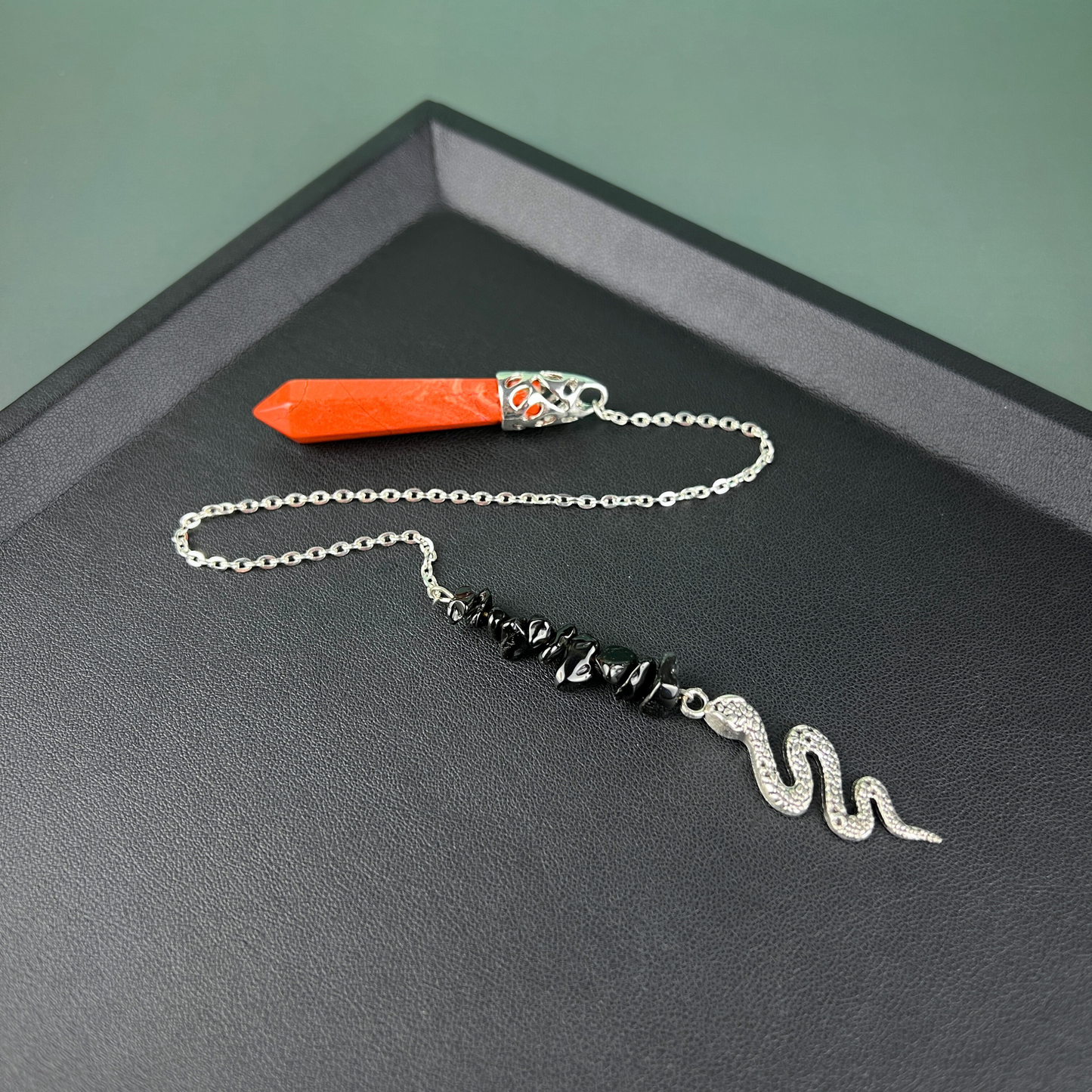 Red jasper and obsidian snake pendulum Baguette Magick