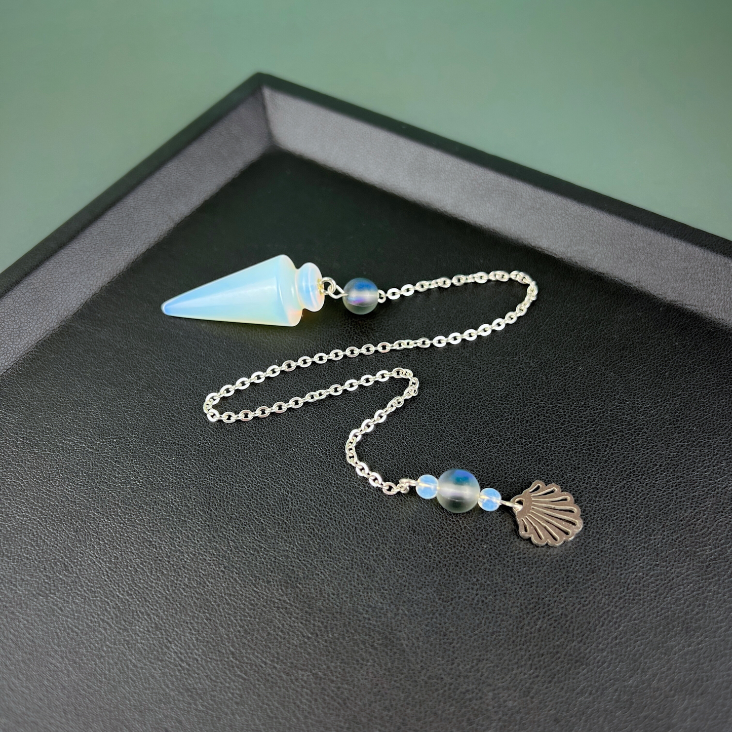Sea witch pendulum made with opalite, stainless steel and mermaid glass Baguette Magick