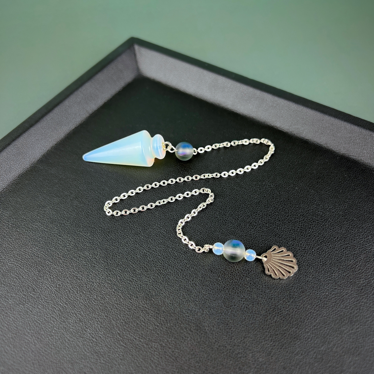 Sea witch pendulum made with opalite, stainless steel and mermaid glass Baguette Magick