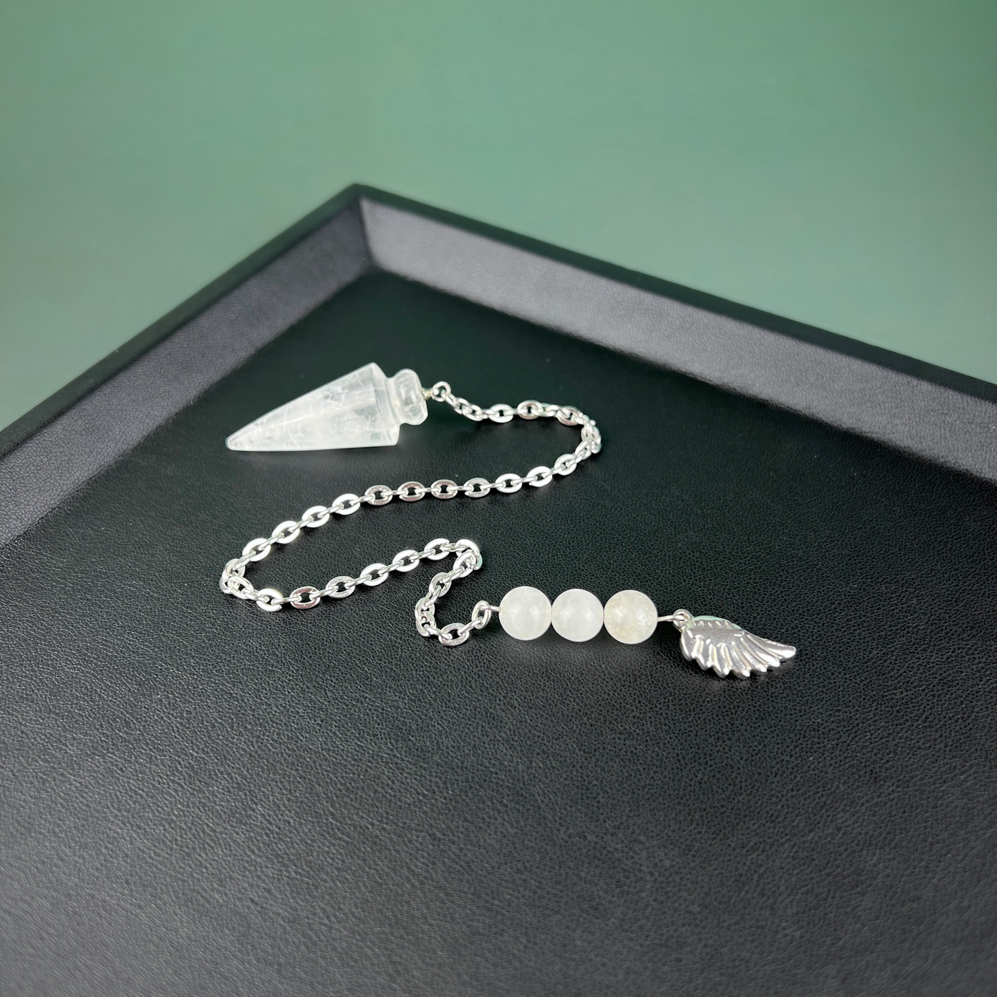 Quartz and stainless steel wing pendulum Baguette Magick