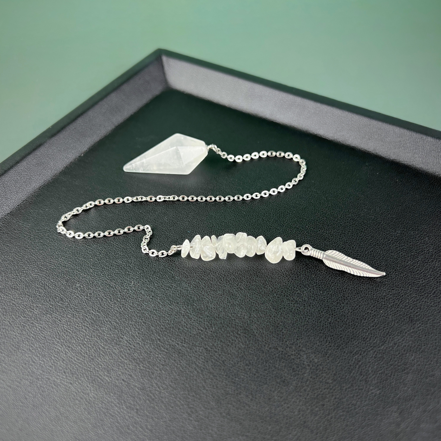 Stainless steel clear quartz and feather pendulum Baguette Magick
