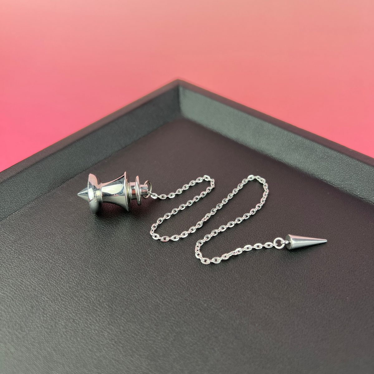 Point and dome dowsing metal pendulum with a spike charm Baguette Magick