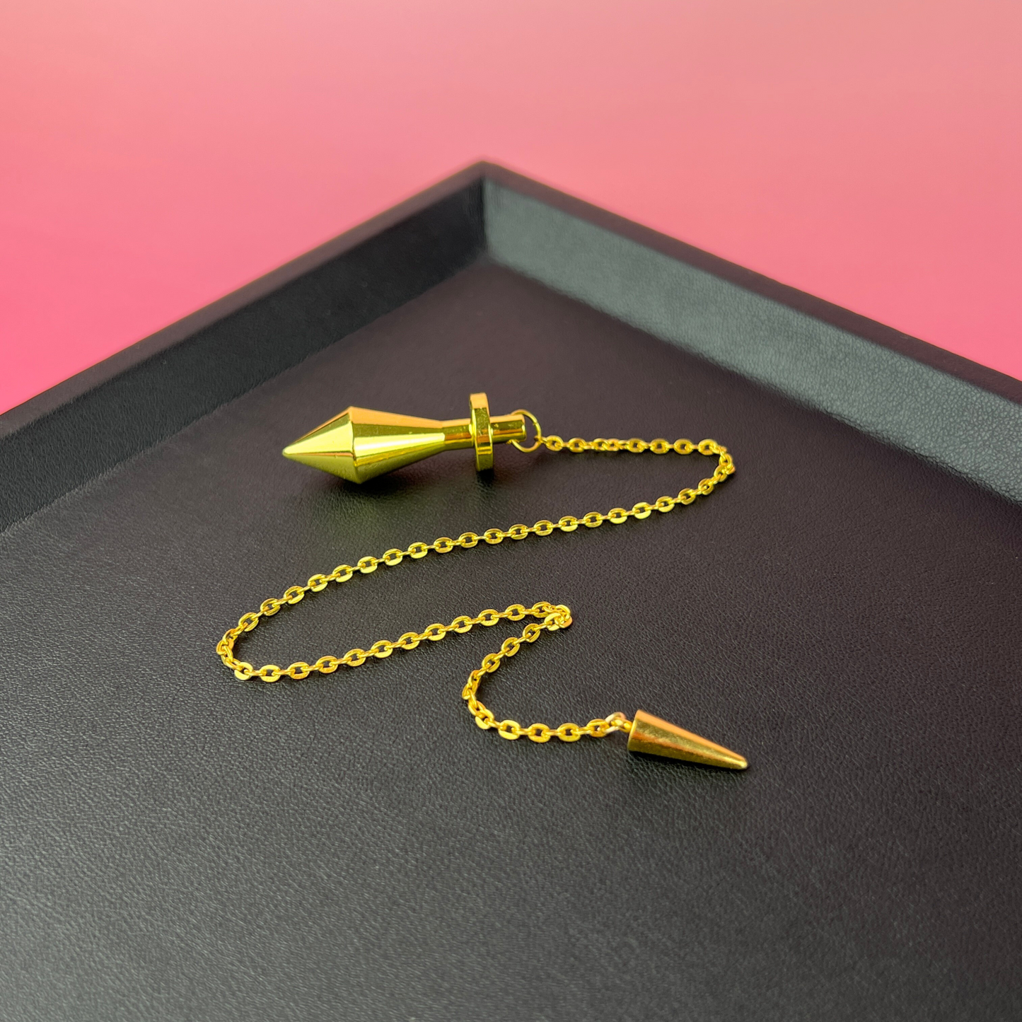 Golden long point dowsing metal pendulum with a spike charm Baguette Magick