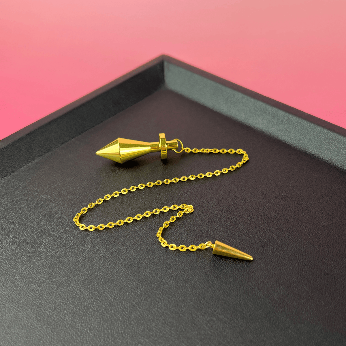 Golden long point dowsing metal pendulum with a spike charm Baguette Magick