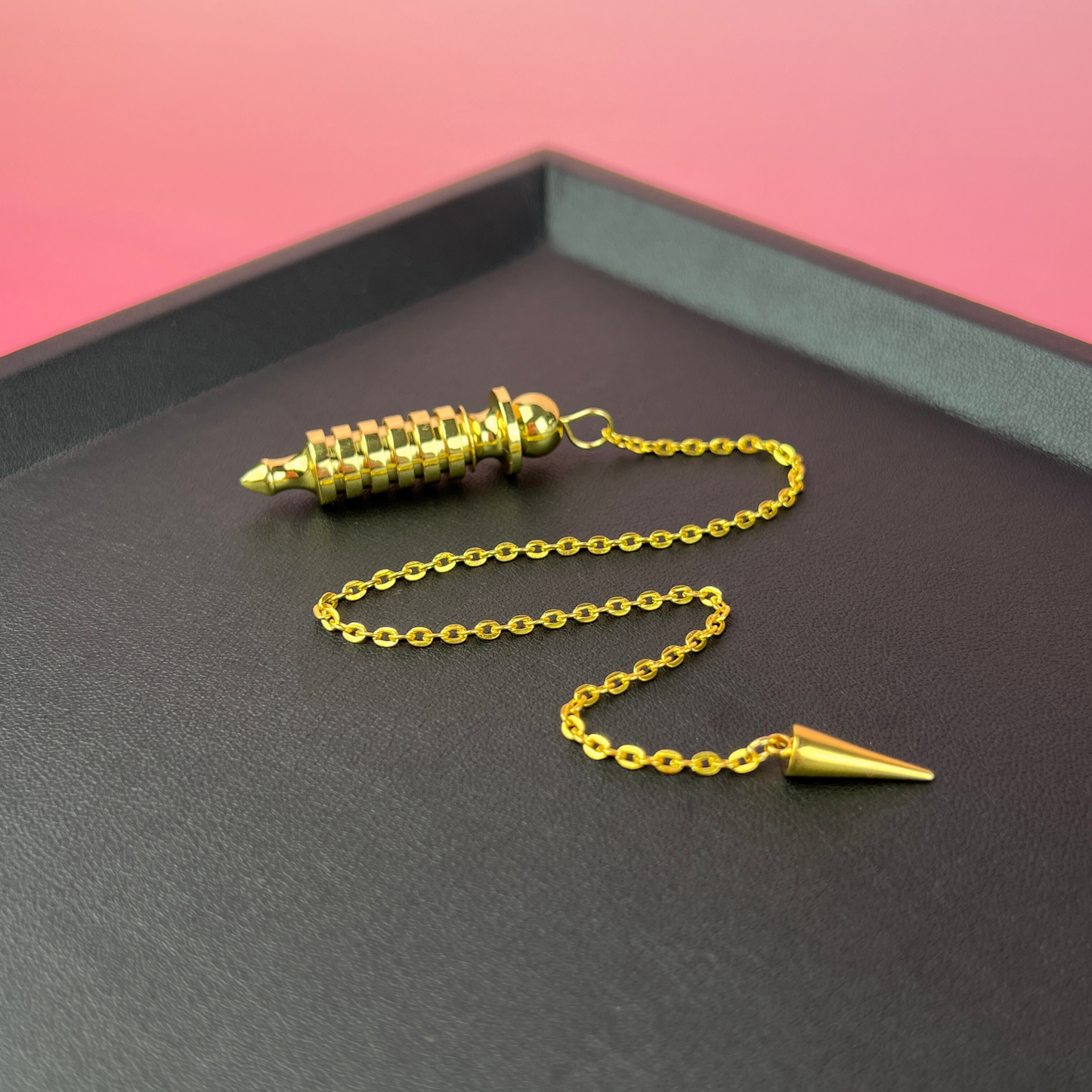 Golden Egyptian Isis dowsing pendulum with a chamber Baguette Magick