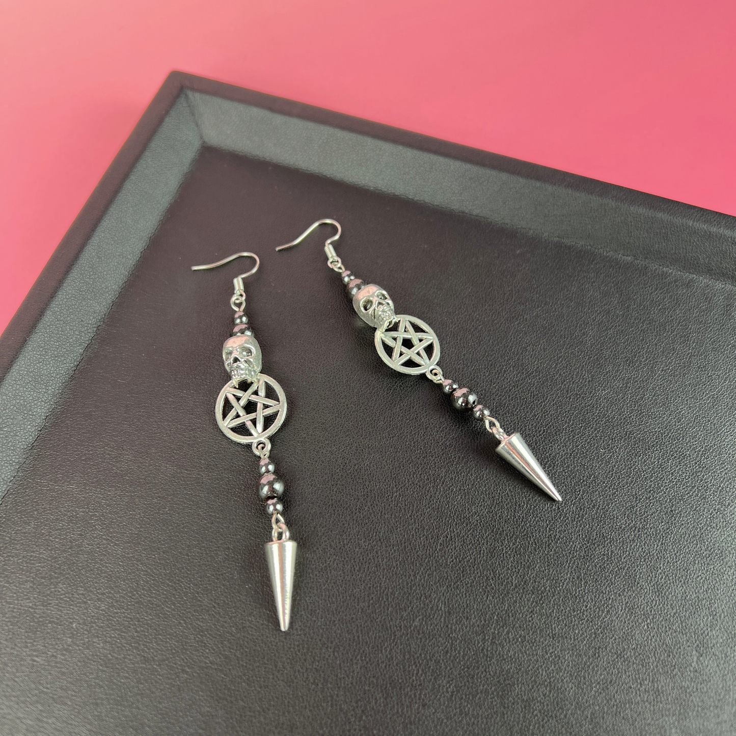 Skulls pentacles spikes and magnetic hematite earrings Baguette Magick