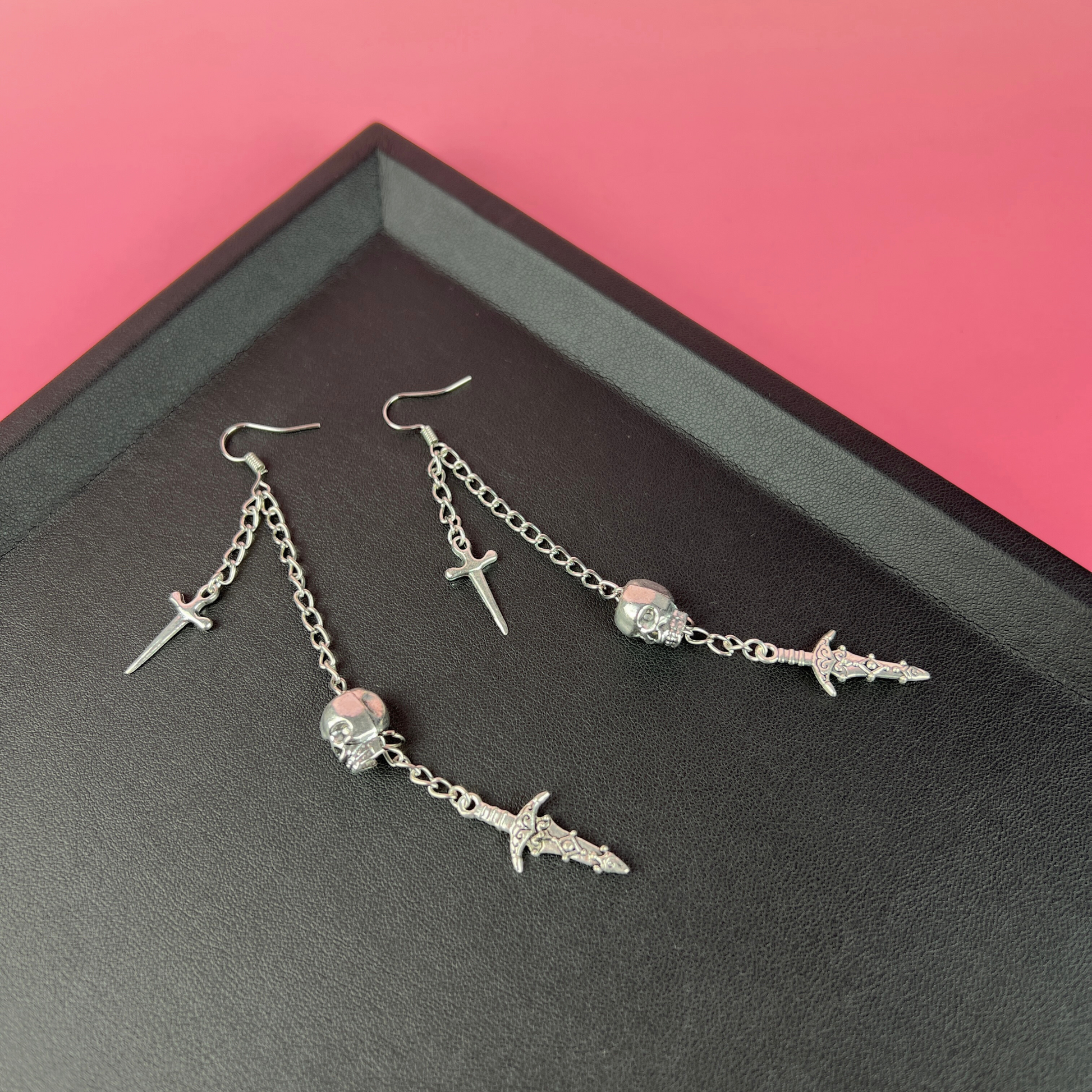 Skull and daggers dangle & drop earrings Baguette Magick
