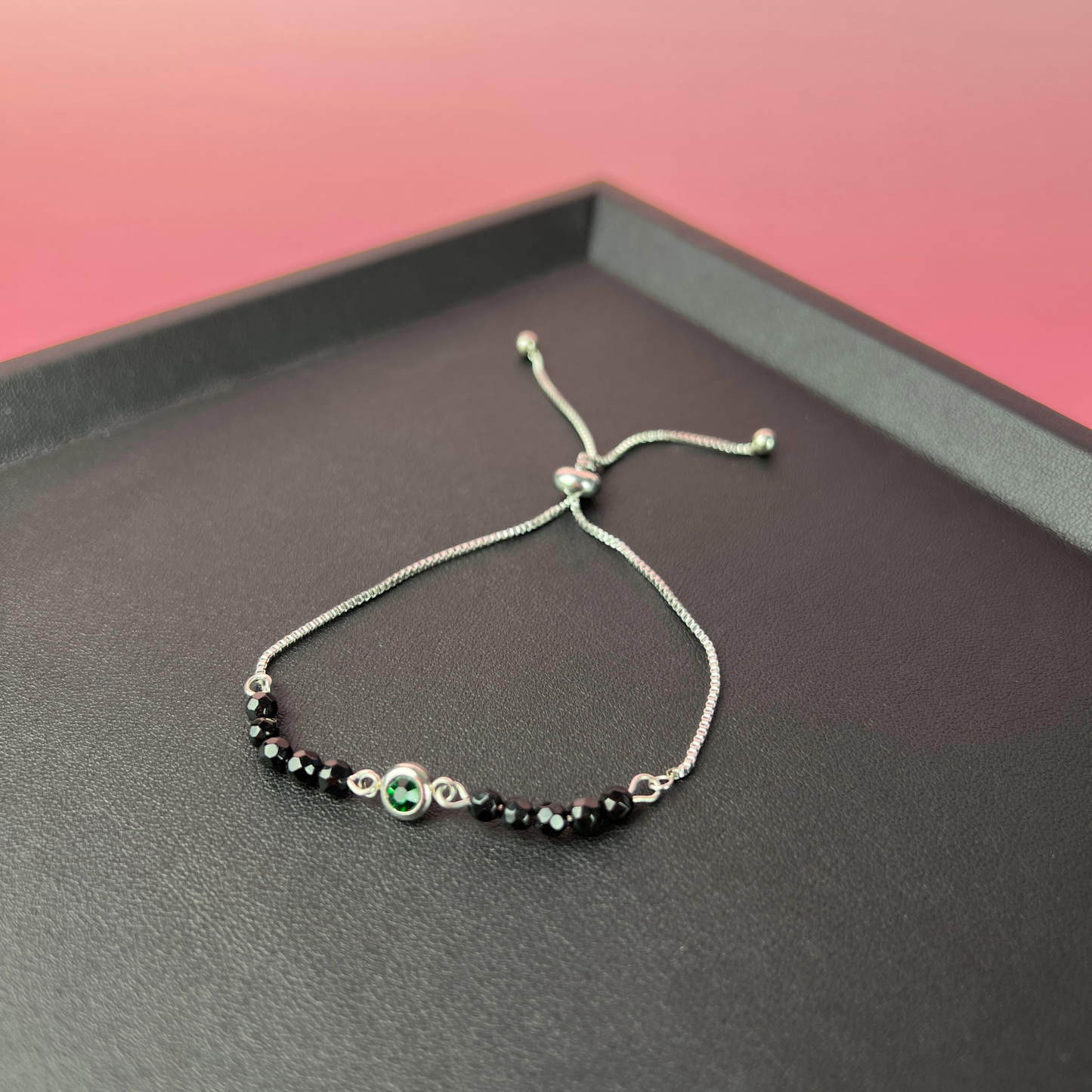 Faceted onyx and emerald green rhinestone slider bracelet Baguette Magick