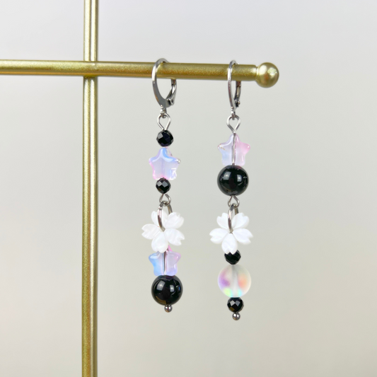 The Celestial Nocture earrings: Rainbow Obsisidan, Onyx, Holo glass, stars and Sakura flowers Baguette Magick