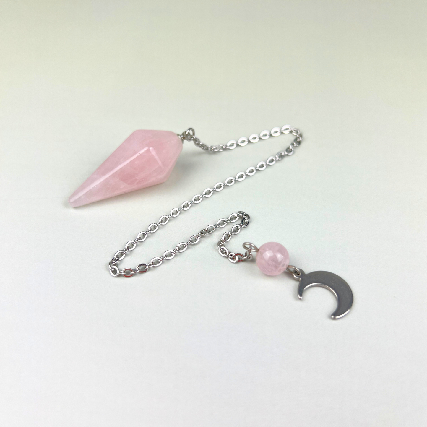 Rose quartz and crescent moon pendulum Baguette Magick
