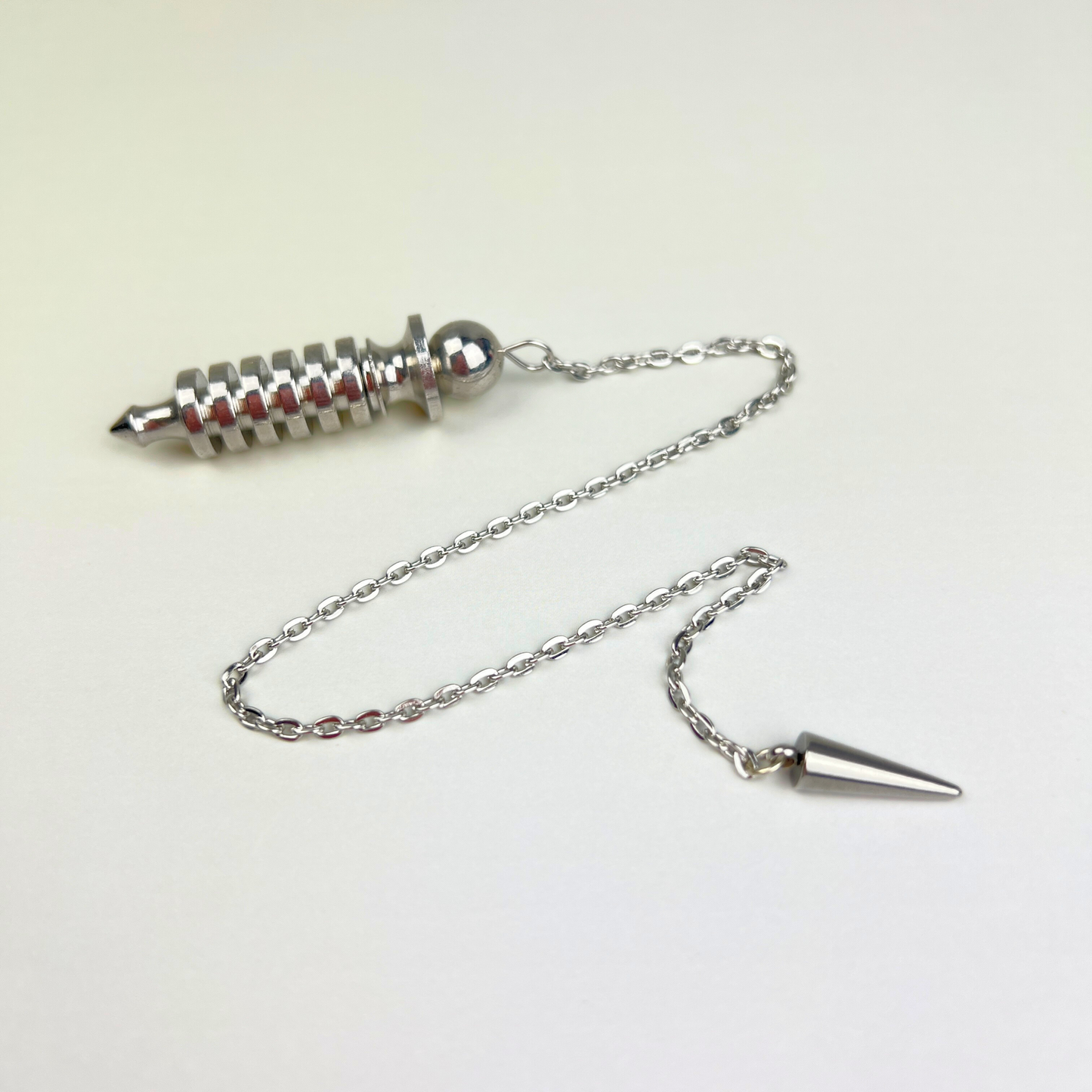 Egyptian Isis metal dowsing pendulum with a chamber Baguette Magick