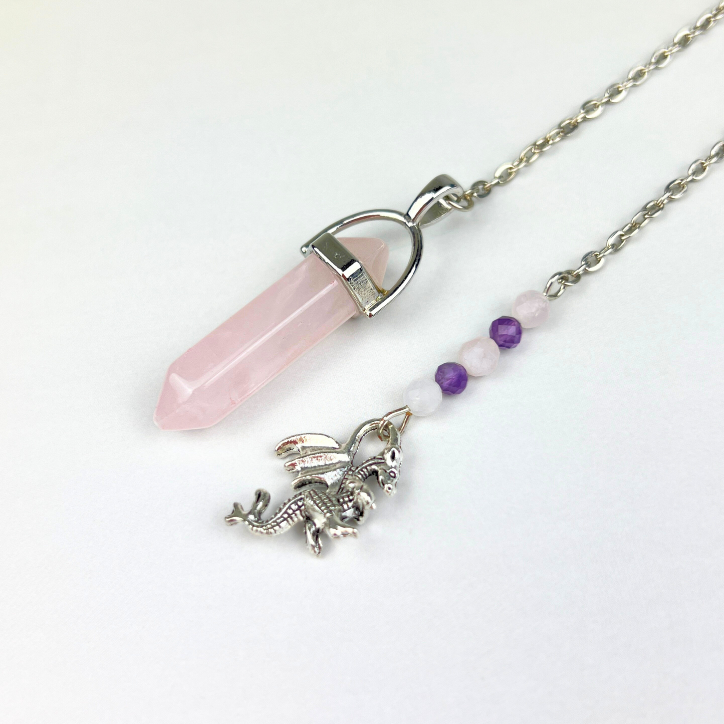 Rose quartz and amethyst dragon dowsing pendulum Baguette Magick