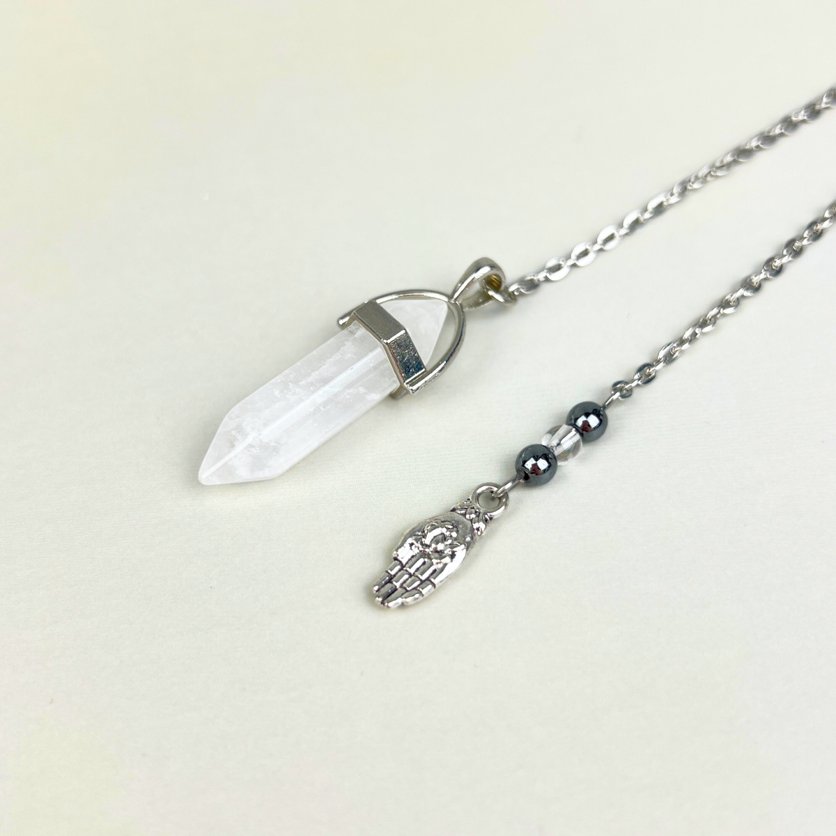 Quartz and hematite hand pendulum Baguette Magick