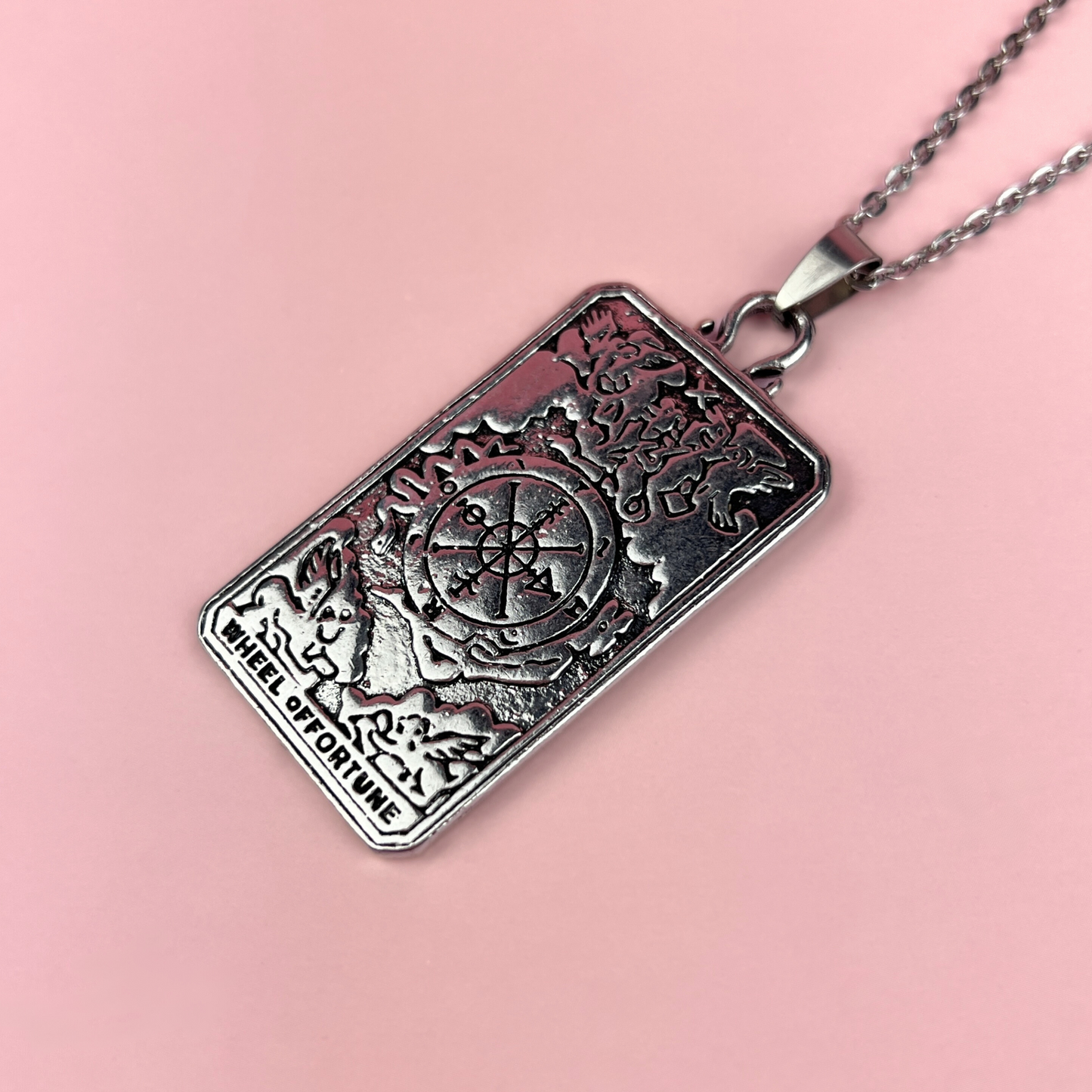 Wheel of fortune tarot arcana necklace with a reversible pendant Baguette Magick