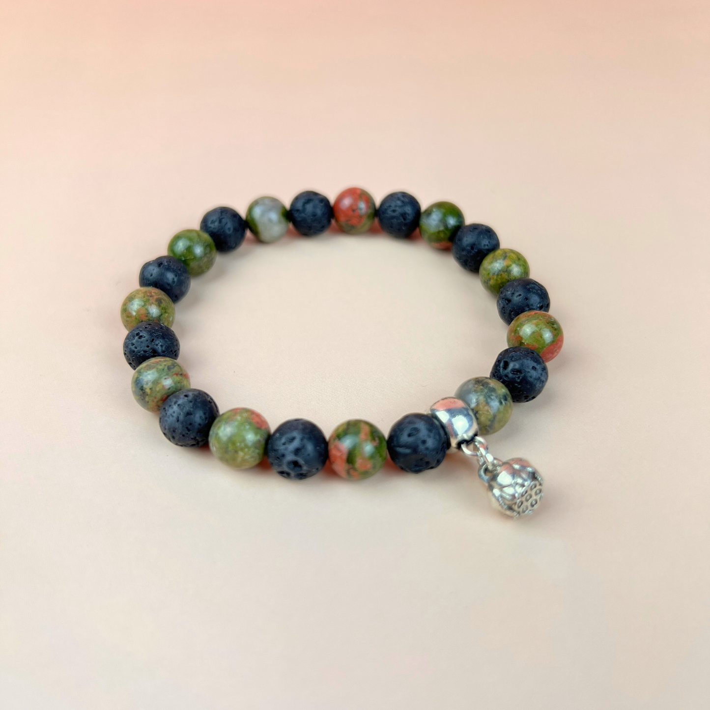 Unakite and lava mala beaded bracelet with a lotus seed charm Baguette Magick