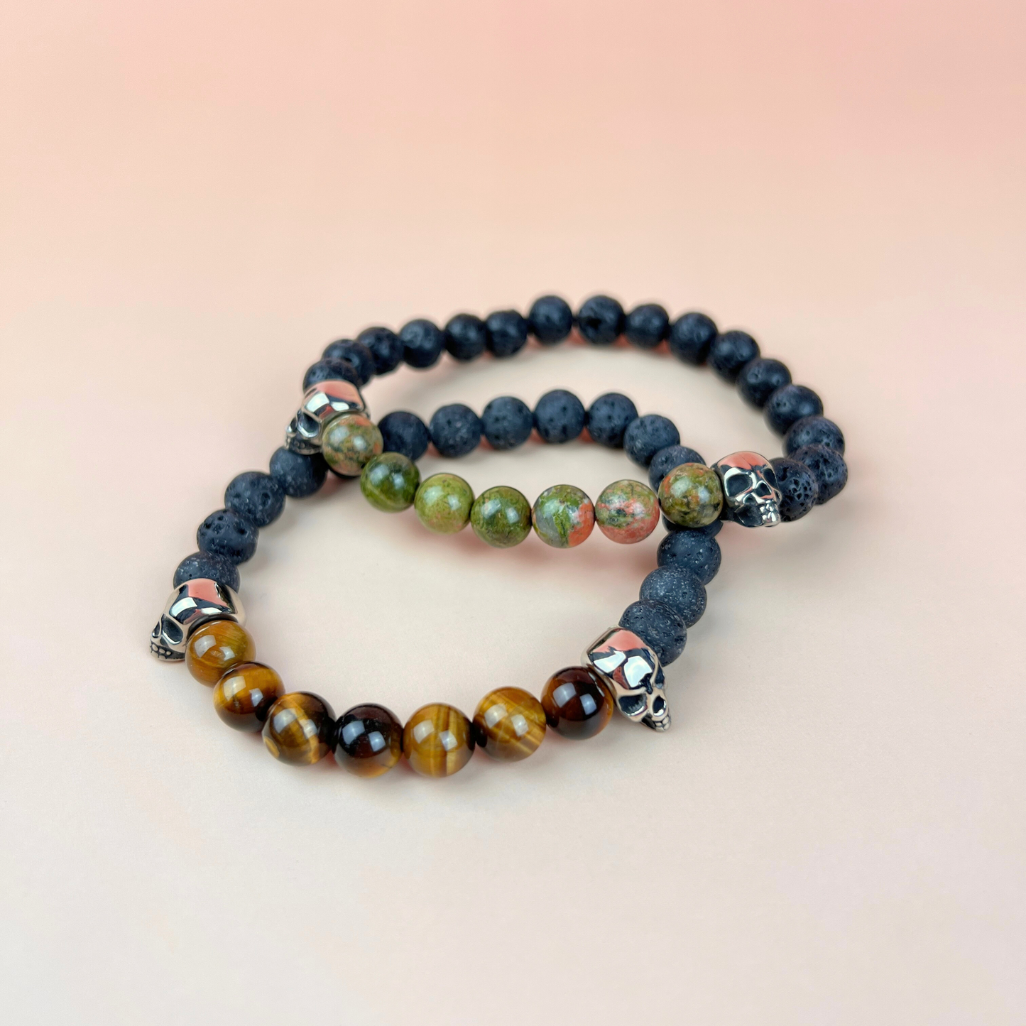 Lava rock and unakite or tiger's eye mala bracelet, with skulls Baguette Magick