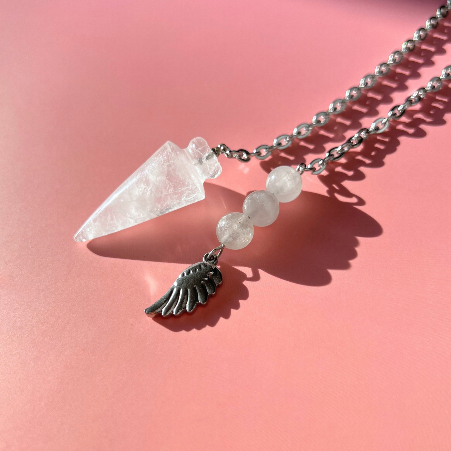 Quartz and stainless steel wing pendulum Baguette Magick