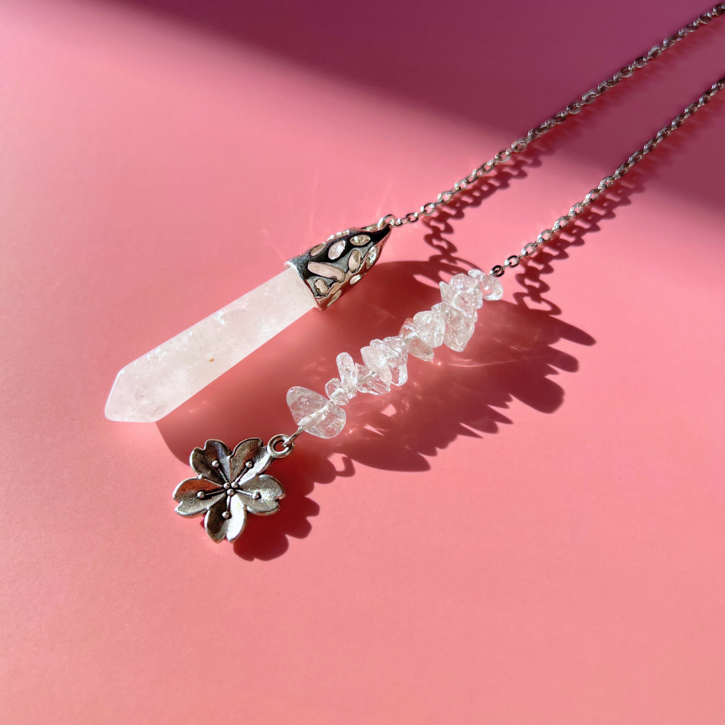 Clear quartz and flower divination pendulum Baguette Magick