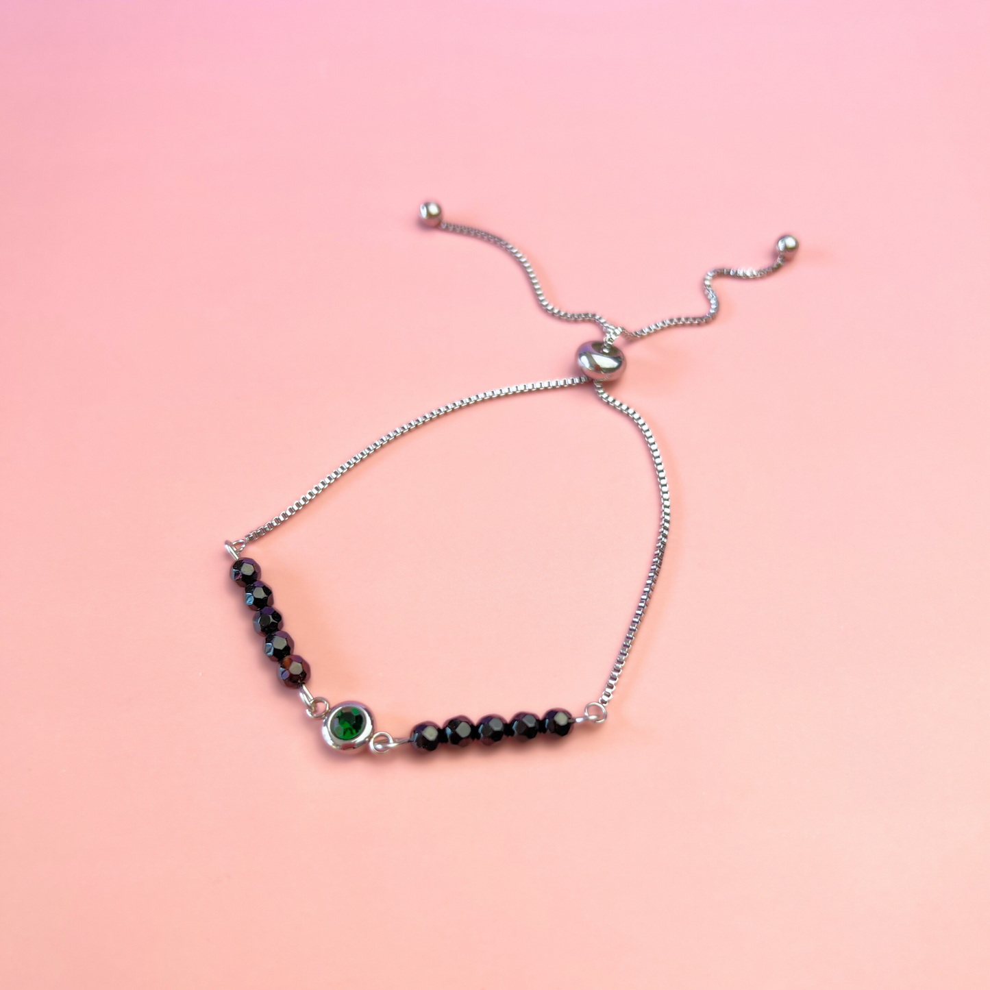 Faceted onyx and emerald green rhinestone slider bracelet Baguette Magick