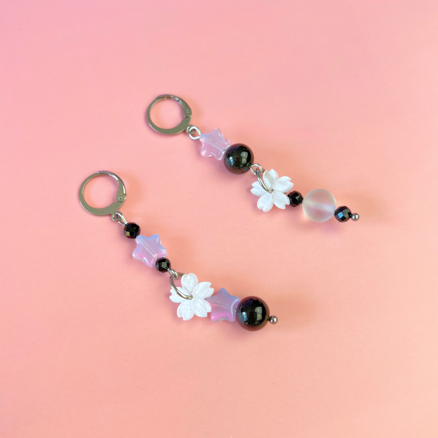 The Celestial Nocture earrings: Rainbow Obsisidan, Onyx, Holo glass, stars and Sakura flowers Baguette Magick
