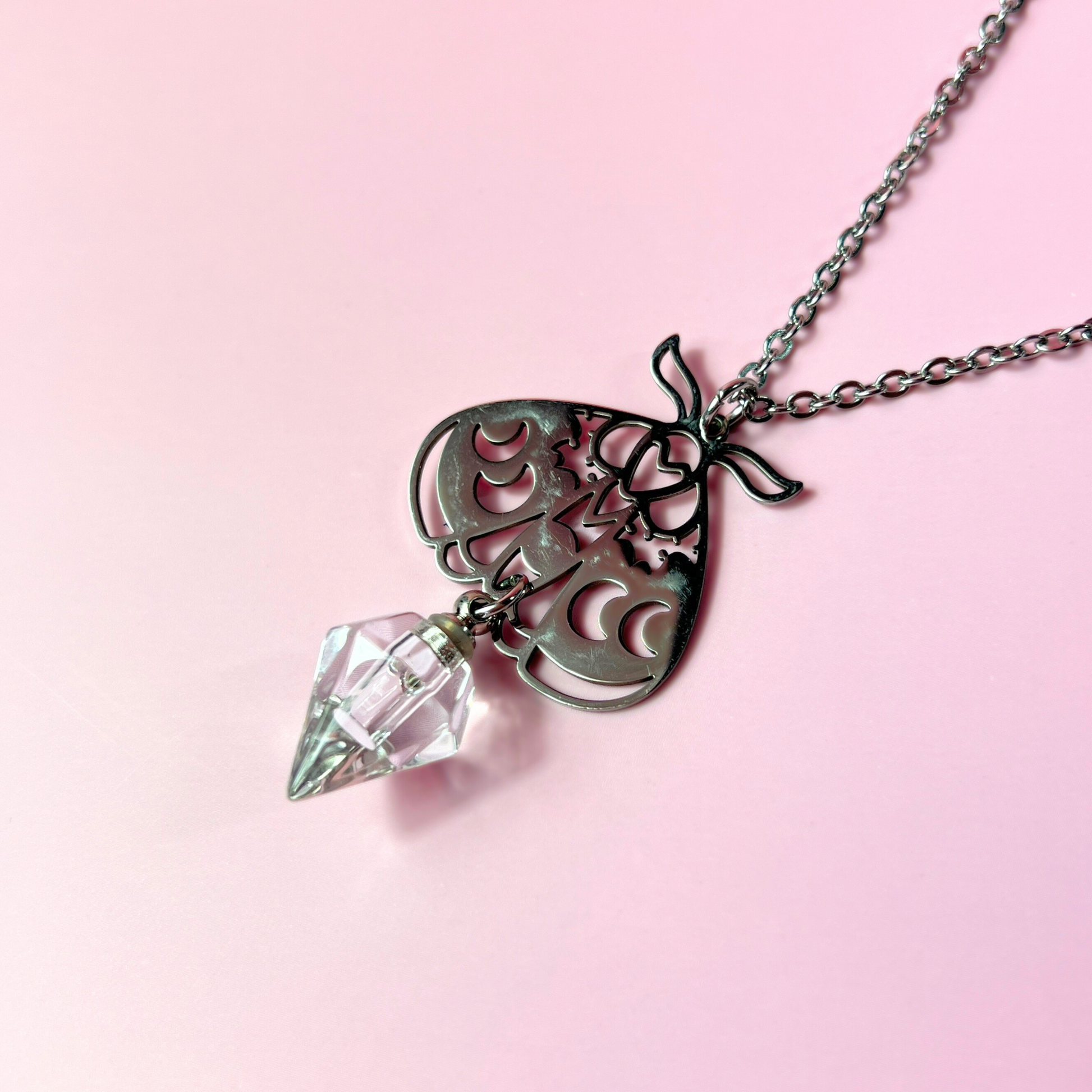 Moth potion necklace with moon phases Baguette Magick