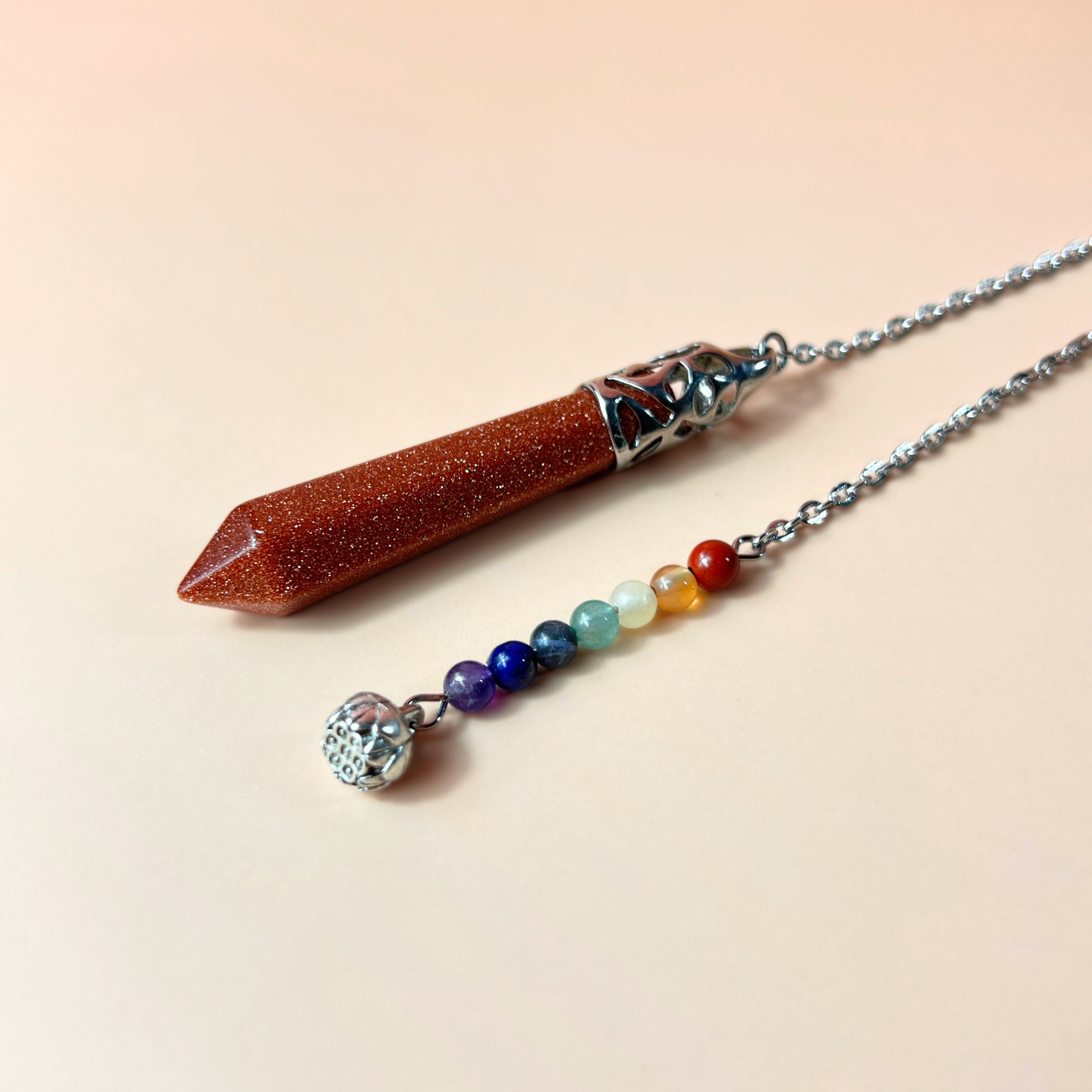 7 chakras goldstone pendulum with a lotus seed Baguette Magick