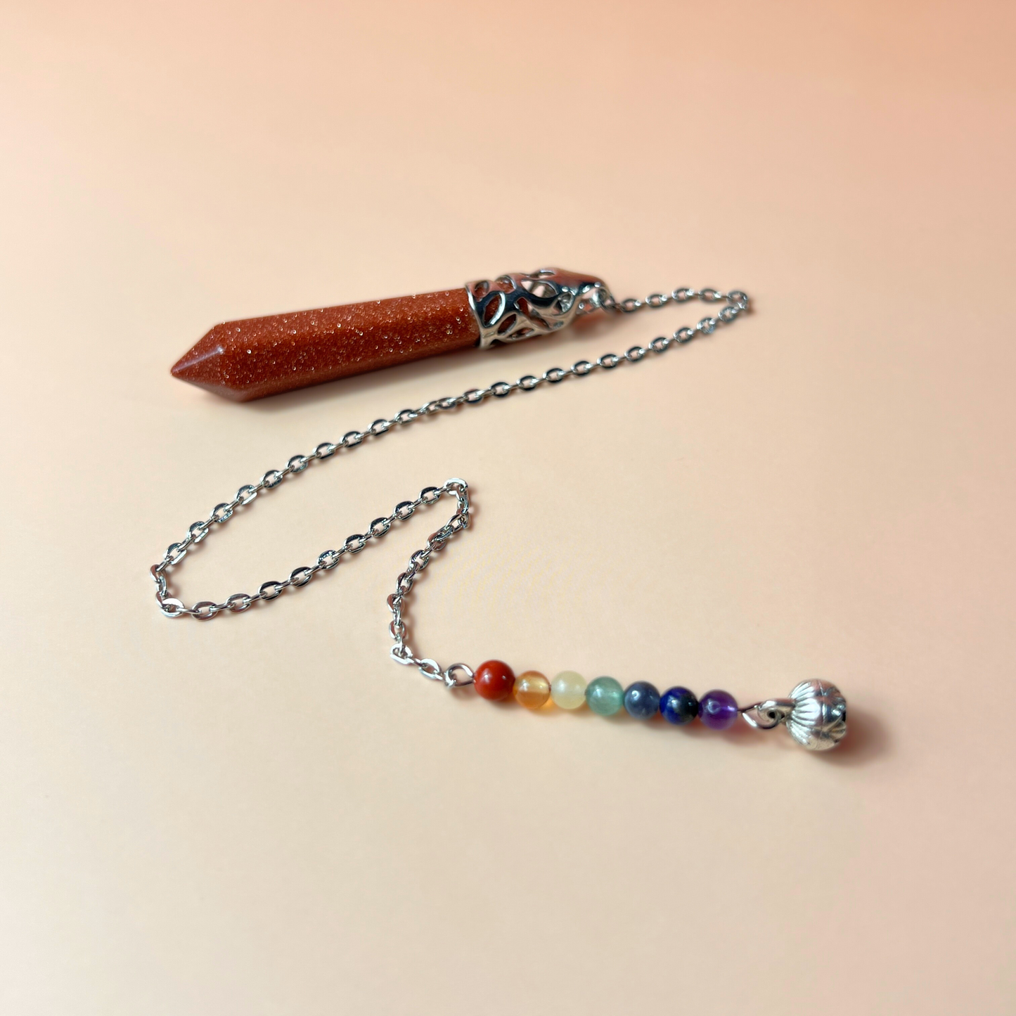 7 chakras goldstone pendulum with a lotus seed Baguette Magick
