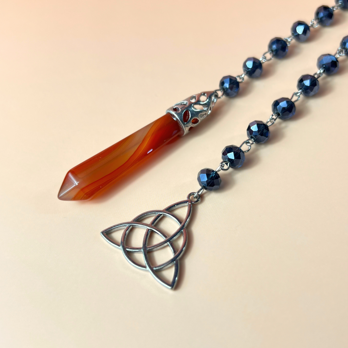 Carnelian gemstone pendulum, rosary chain and triquetra charm Baguette Magick