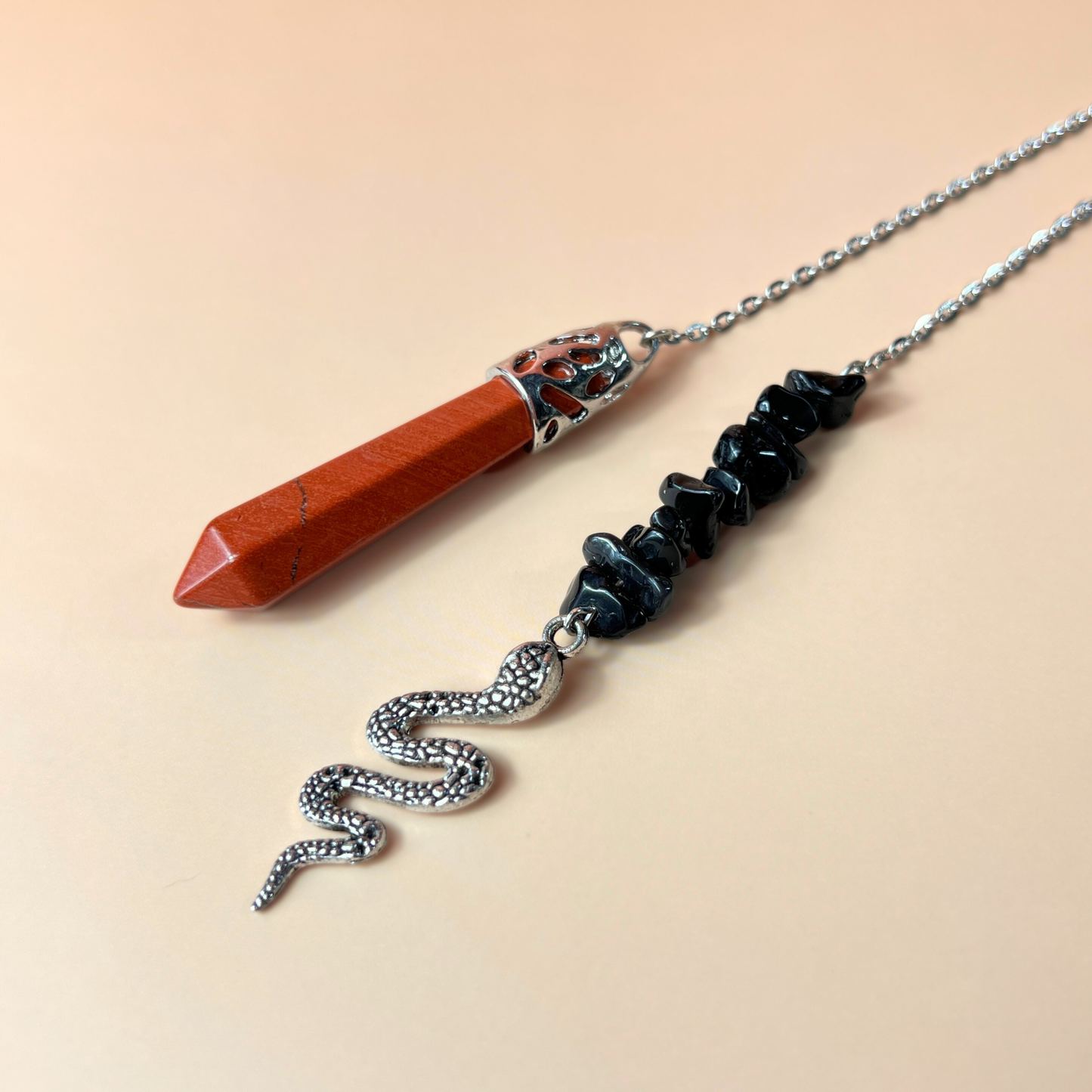 Red jasper and obsidian snake pendulum Baguette Magick