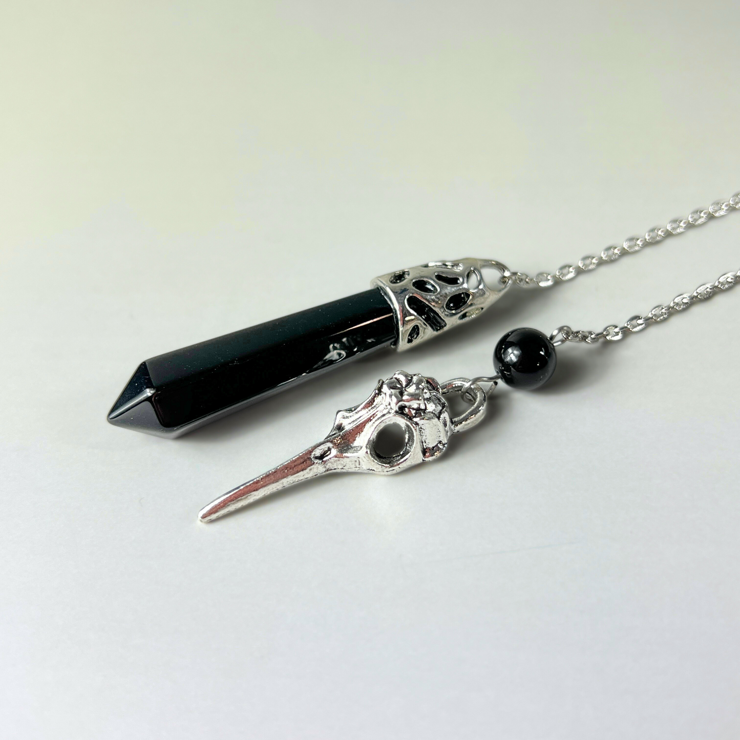 Onyx and bird skull dowsing pendulum Baguette Magick