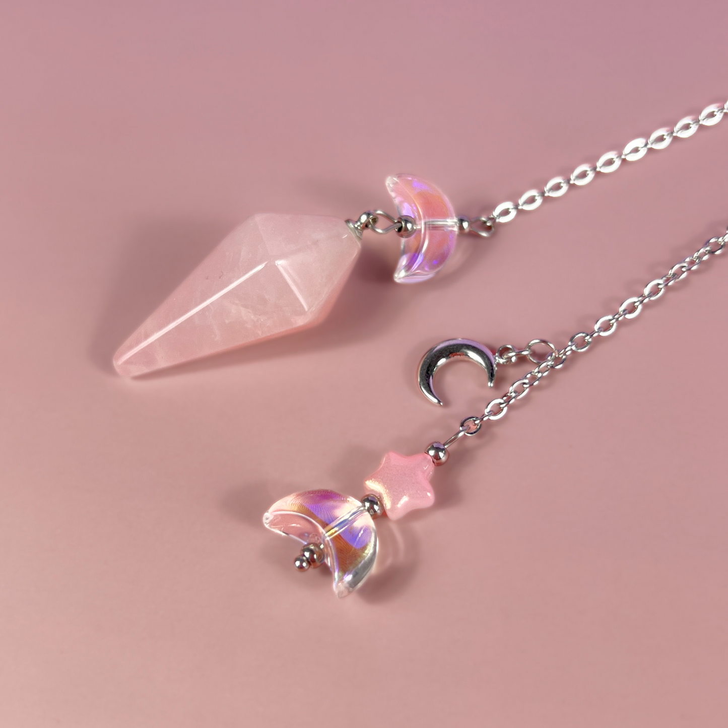 Celestial rose quartz dowsing pendulum, with moon & star charms