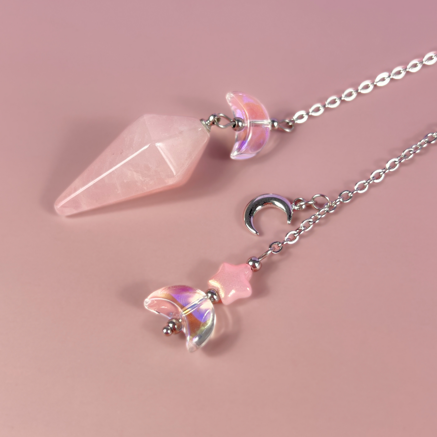 Celestial rose quartz dowsing pendulum, with moon & star charms