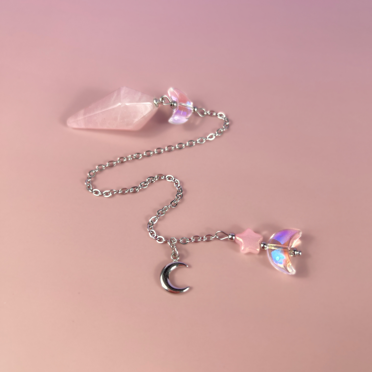 Celestial rose quartz dowsing pendulum, with moon & star charms