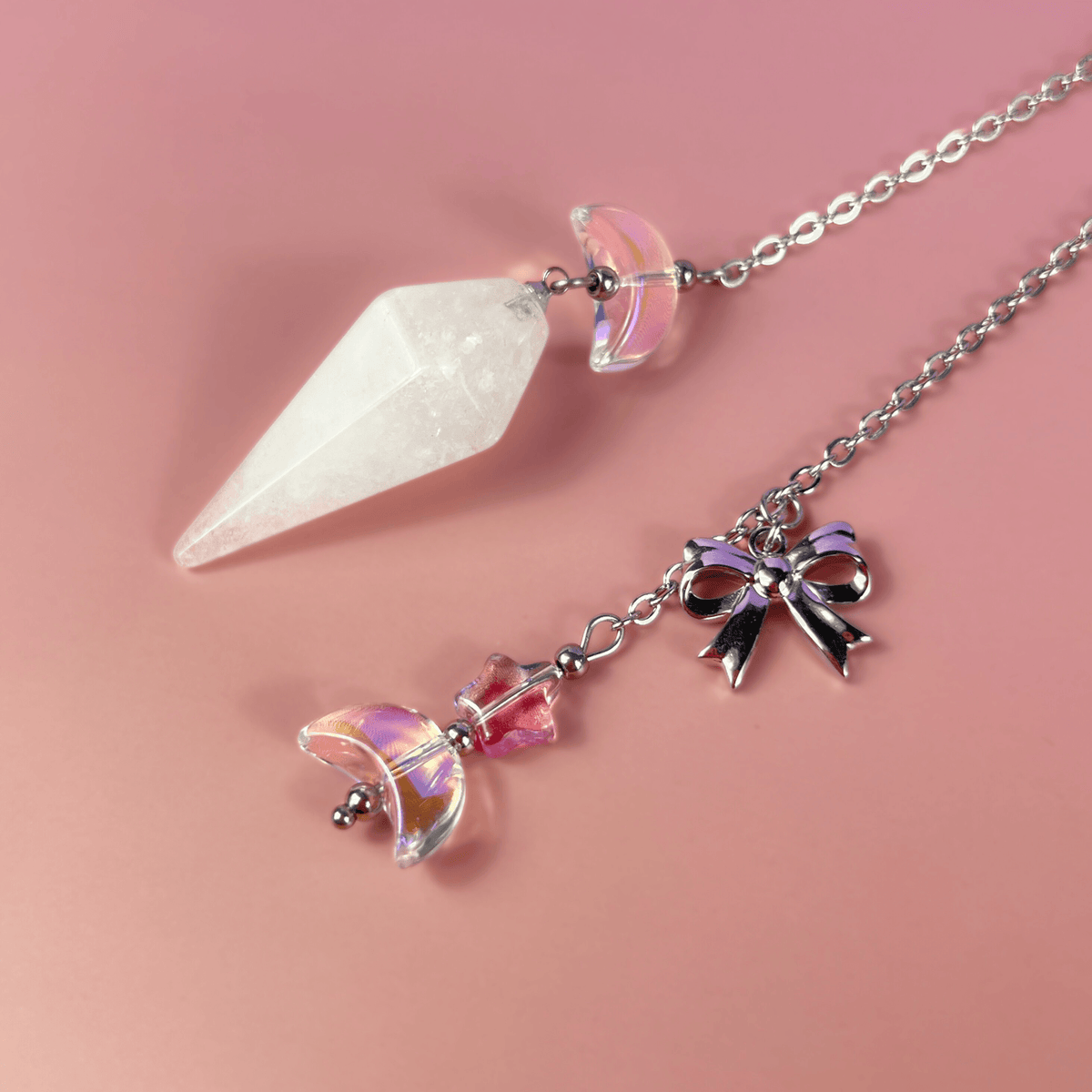 Celestial Clear Quartz dowsing pendulum, with moon, star & bow charms Baguette Magick