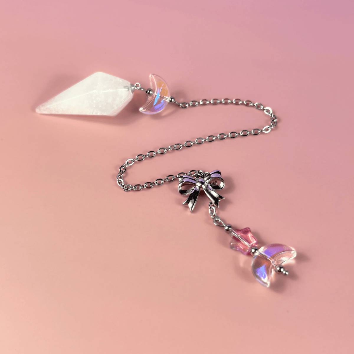 Celestial Clear Quartz dowsing pendulum, with moon, star & bow charms Baguette Magick