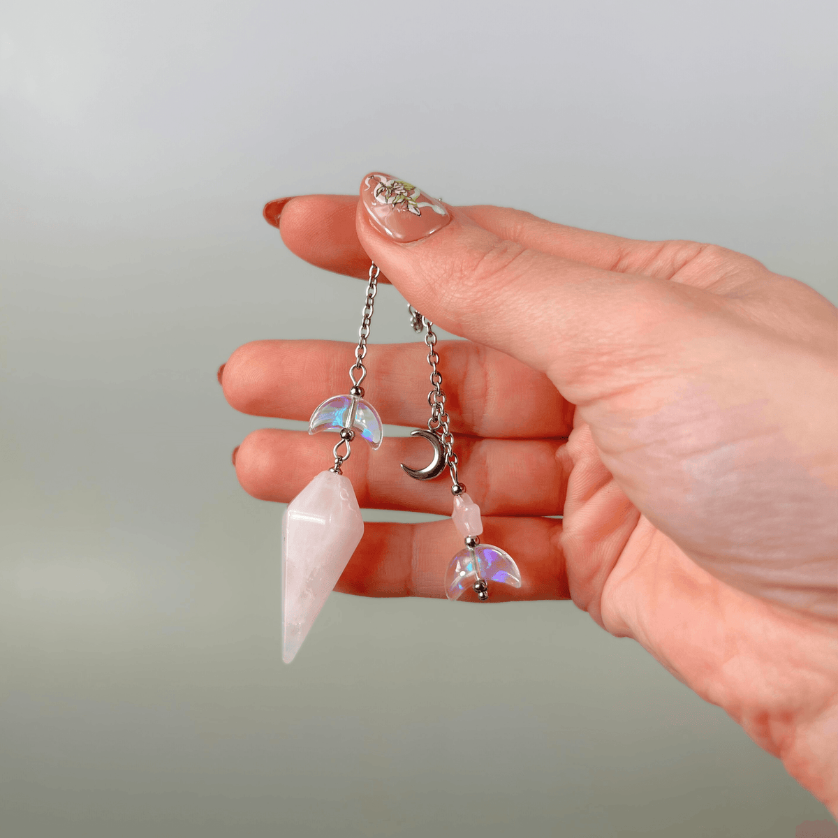 Celestial rose quartz dowsing pendulum, with moon & star charms Baguette Magick