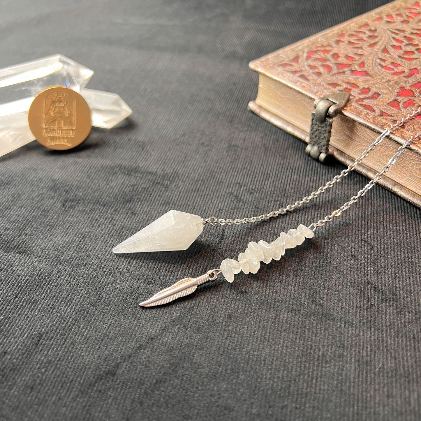 clear quartz gemstone crystal dowsing pendulum feather charm witchcraft altar pagan tool baguette magick