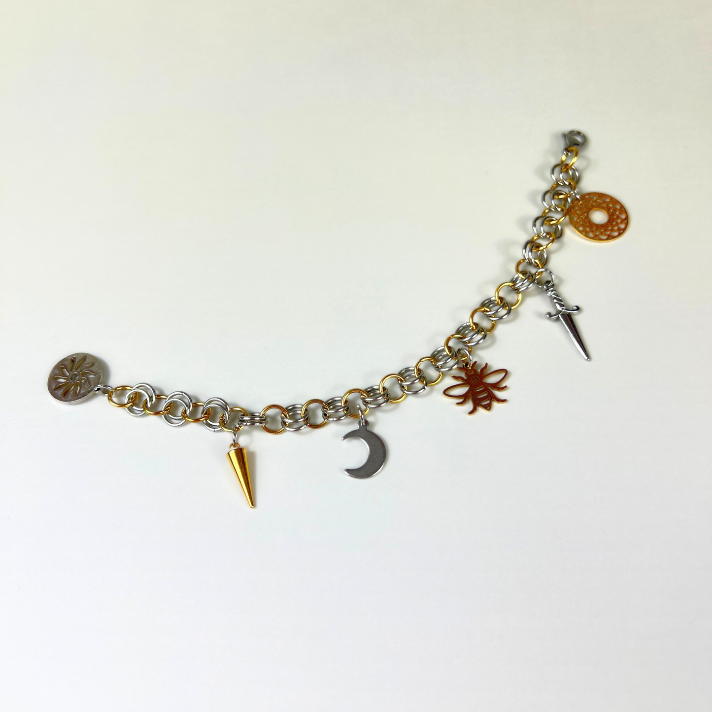 Chainmail charm bracelet, gold and silver tones