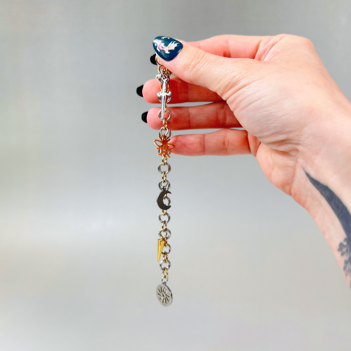 Chainmail charm bracelet, gold and silver tones Baguette Magick