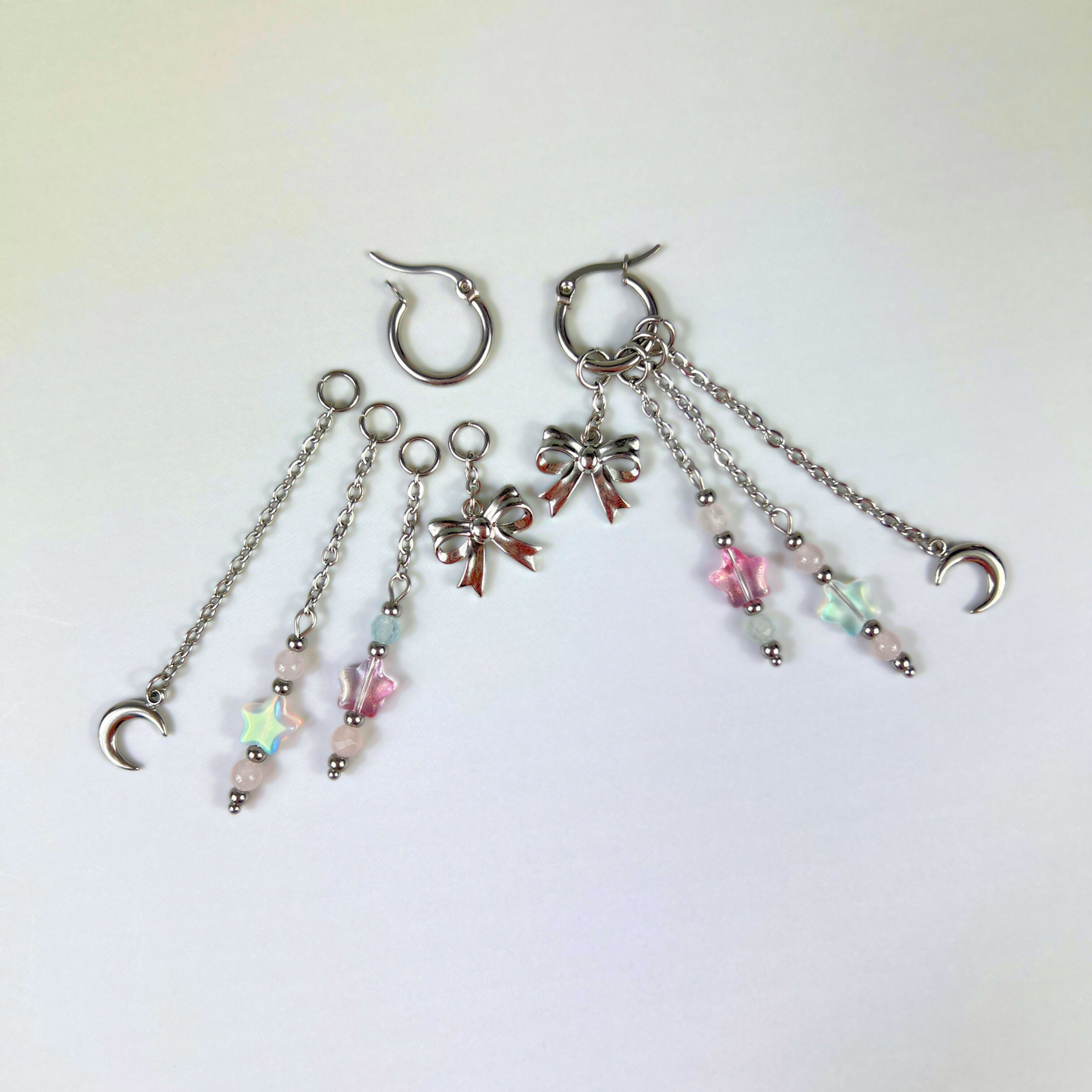 Boucles d'oreilles créoles Mix & Match nœud, lune et étoiles, morganite et quartz rose