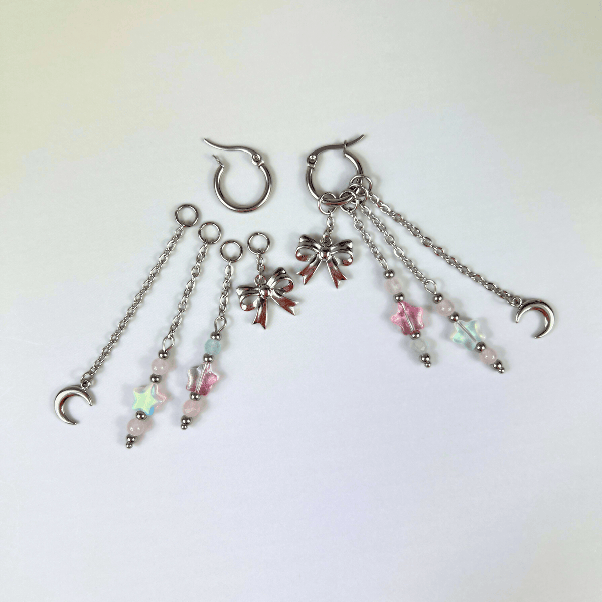Boucles d'oreilles créoles Mix & Match nœud, lune et étoiles, morganite et quartz rose