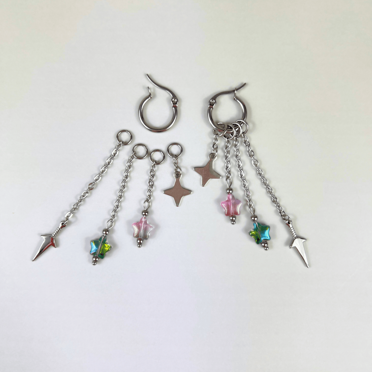 Boucles d'oreilles créoles shuriken et kunai à assortir