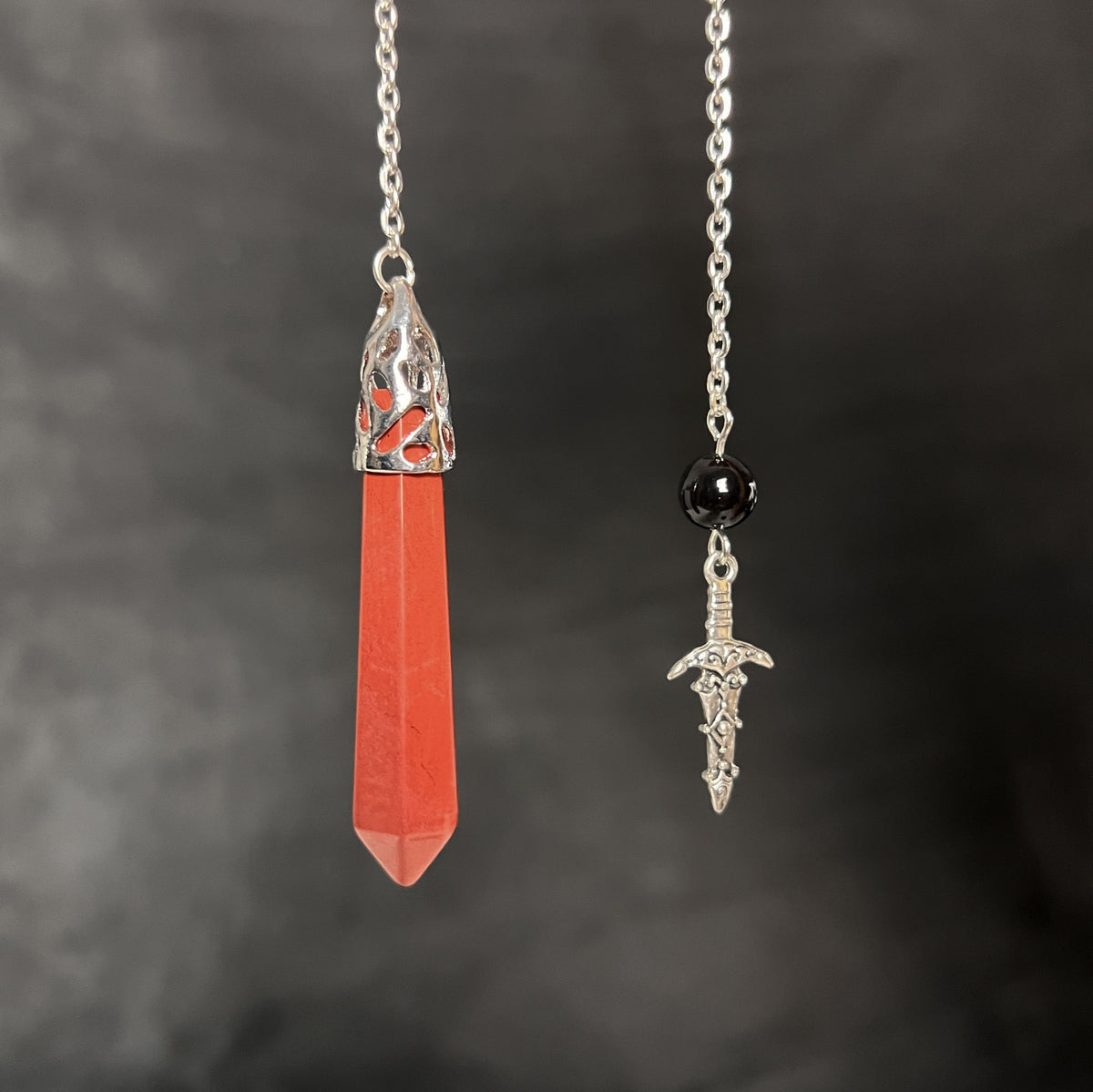 Red jasper and obsidian dagger pendulum Baguette Magick