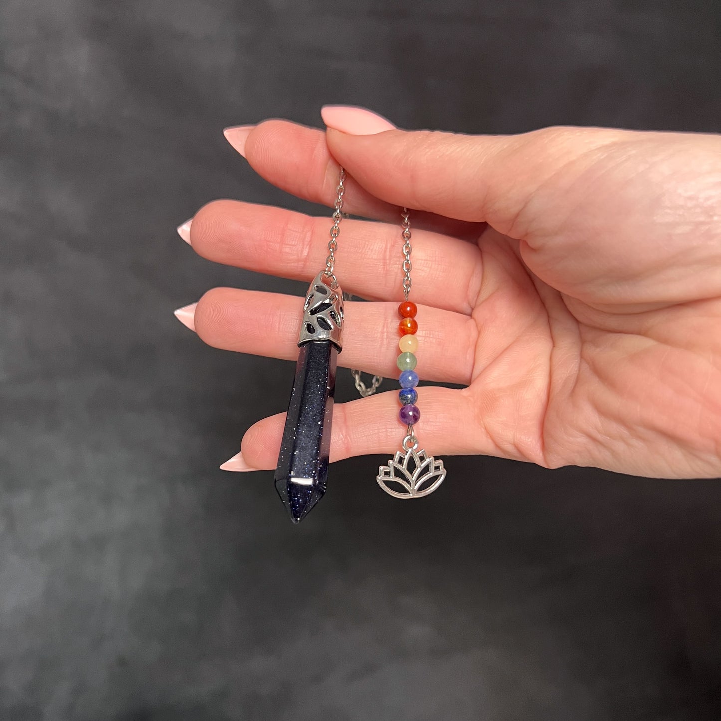 7 chakras blue sandstone pendulum with a lotus charm Baguette Magick