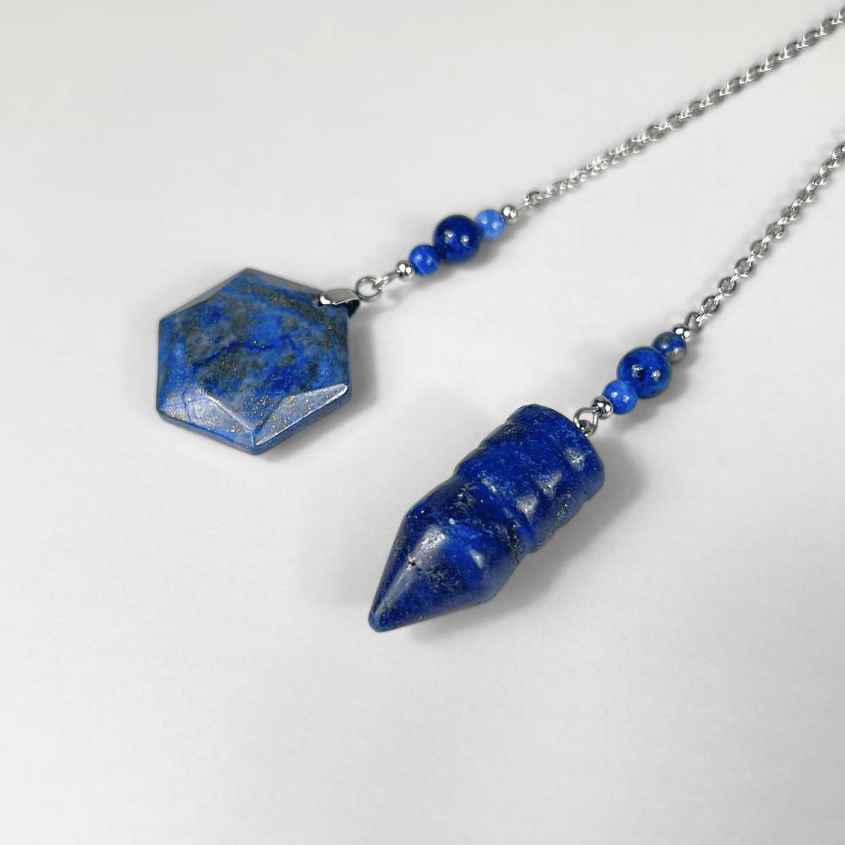 Bullet-shaped Lapis Lazuli pendulum, with a hexagonal gem