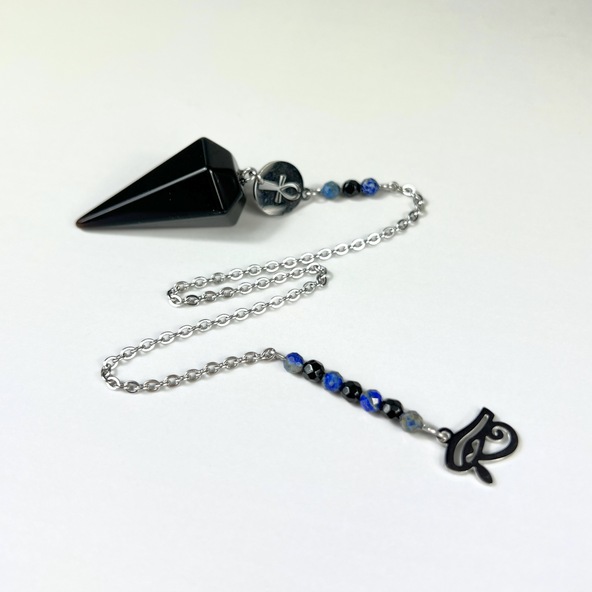 Pendule de divination avec obsidienne, lapis-lazuli, onyx, œil d'Horus et Ankh